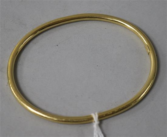 A Tiffany & Co 18ct gold bangle.